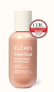 Elemis Superfood Glow Priming Moisturiser container elegantly presented, symbolizing a dual-act of hydration and priming that promises a healthy, vibrant glow while prepping the skin for makeup application.