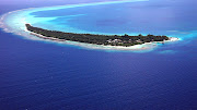 . to the remote island with its lush vegetation and clear azure waters. (kuramathi island in the indian ocean )