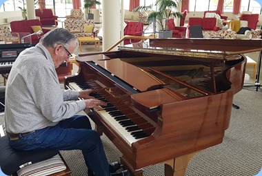 Roy Steen playing the Steinway grand piano.