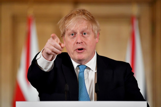 Britain’s Johnson stable as lockdown extension looms