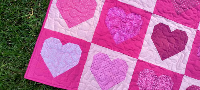 Pink heart quilt made with fabrics all from JOANN