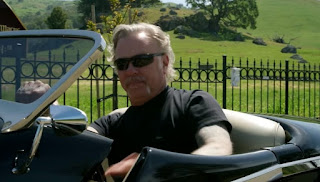 Cali Tee Hetfield's dad James Hetfield sitting inside the car