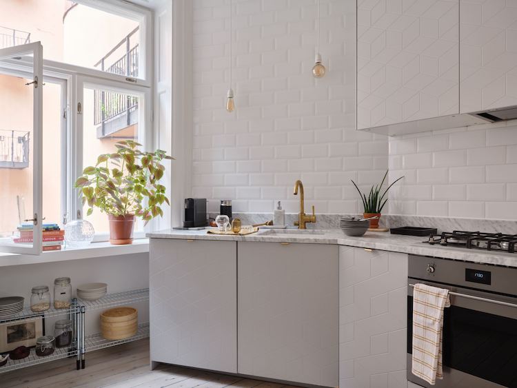 A White Swedish Home with an Angled Kitchen