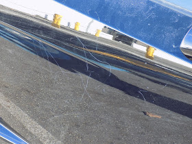 Key scratches on 2005 Lamborghini Gallardo before repairs at Almost Everything Auto Body.