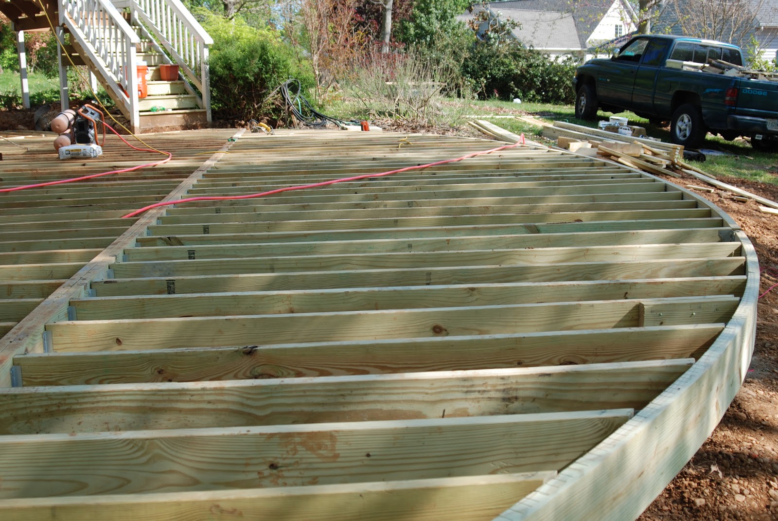 How To Set Support Beams And Rim Joists For A Wooden Deck Ask Home 