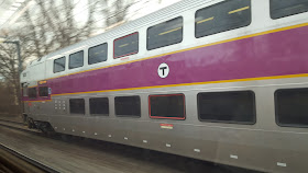 The Franklin Dean Train getting passed by another commuter rail line approaching Boston