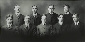 Group photo of the nine members of the Tuck School class of 1903