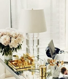 vignette styling coffee table gold accessories acrylic lamp