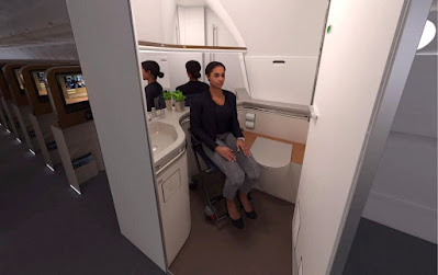 Wheelchair bound woman in accessible airline restroom photo