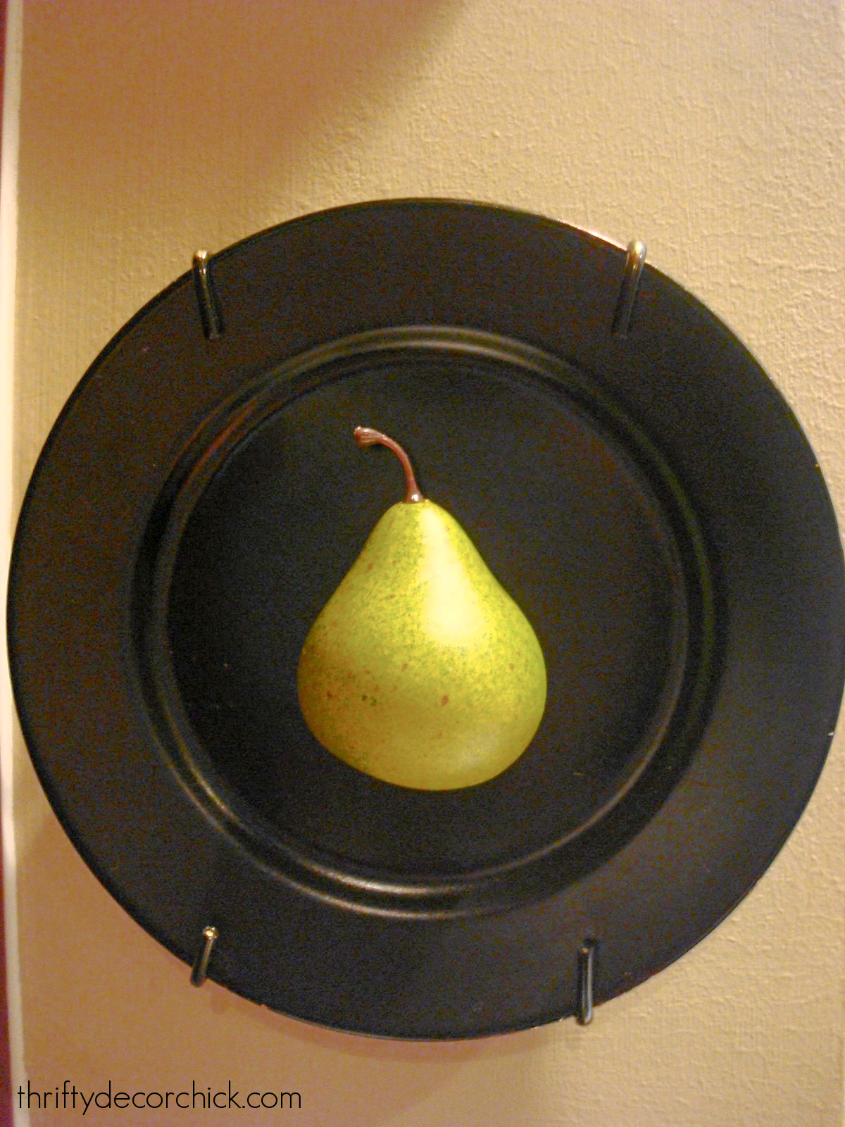 black plate faux fruit art