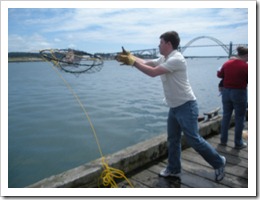 Me tossing the trap off the dock.