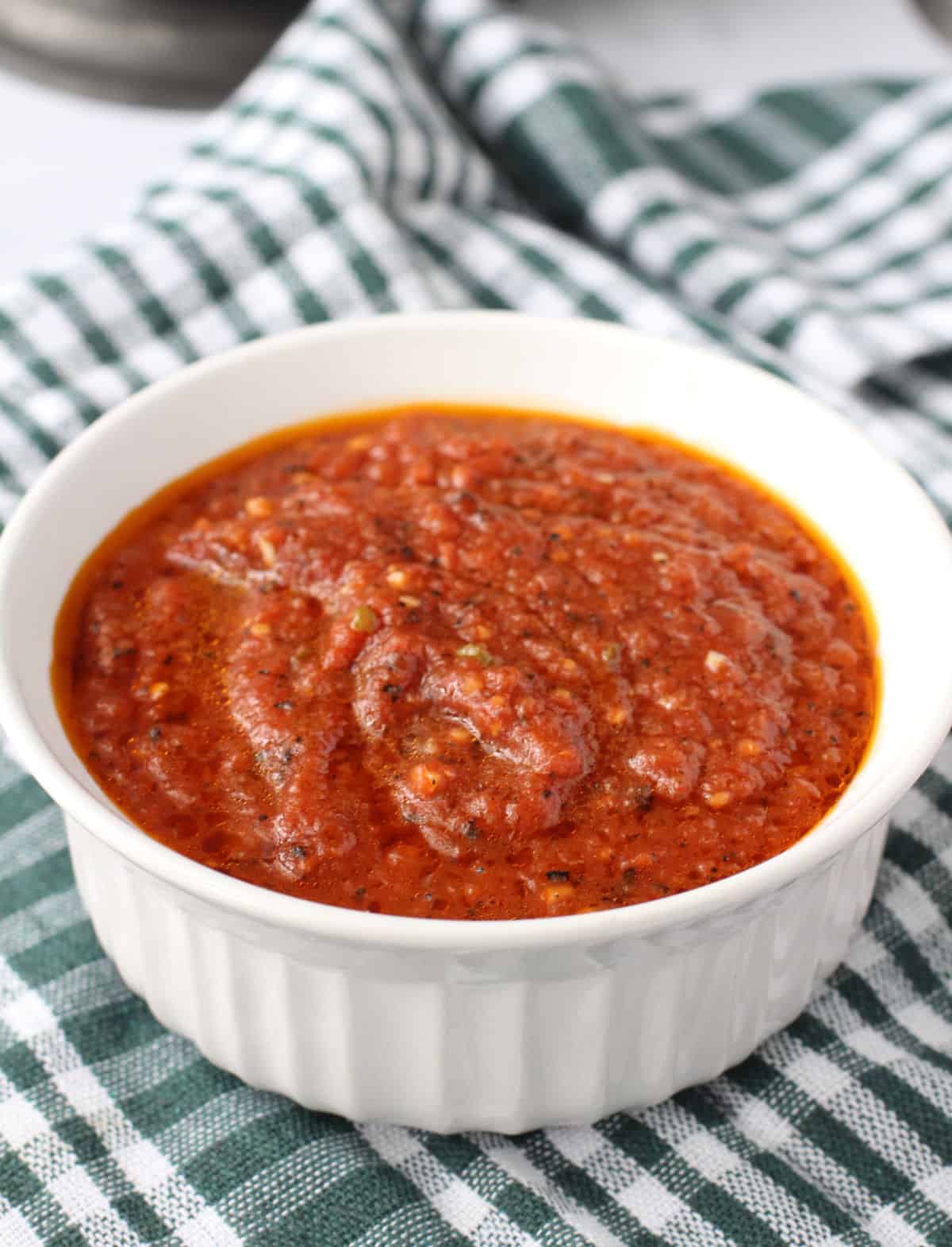 Homemade tomato sauce in a casserole bowl.