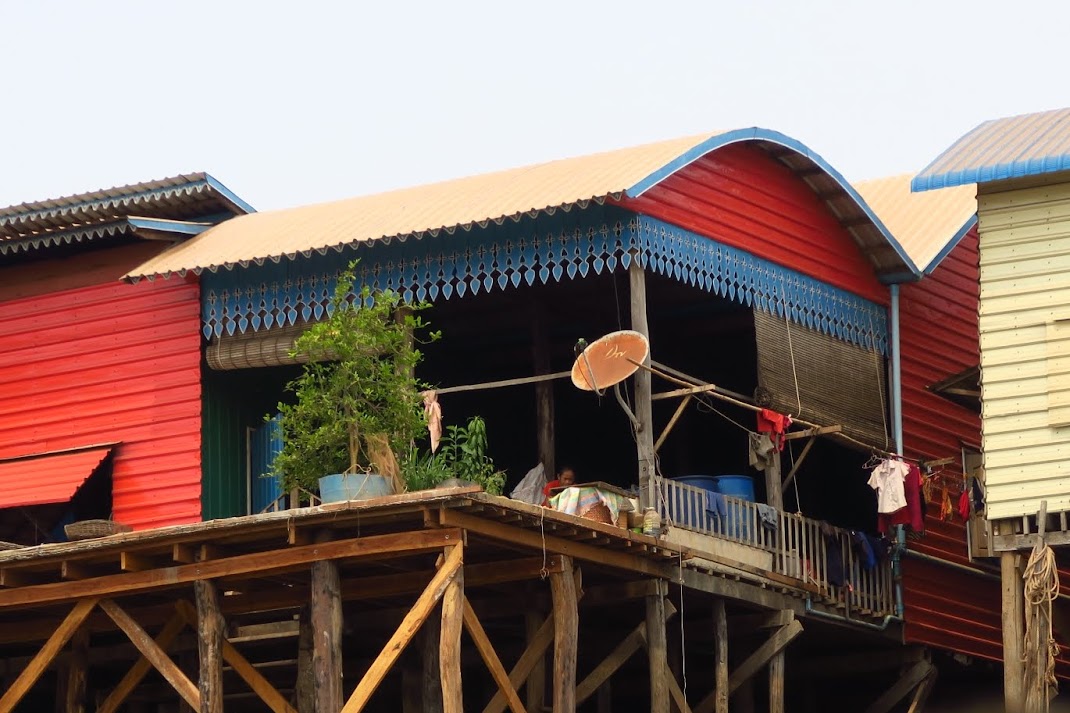 boat trip downstream from the stilt village of Kampong Kheang to a floating village in the middle of Tonle Sap and back