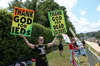 Megan Phelps-Roper when she was 20, protesting at the gates of the Arlington National Cemetery funeral of Marine Lance Cpl. Kevin A. Lucas.CREDIT:AUTH/MCT/TRIBUNE NEWS