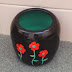 Black & Teal Pottery with Red Flowers