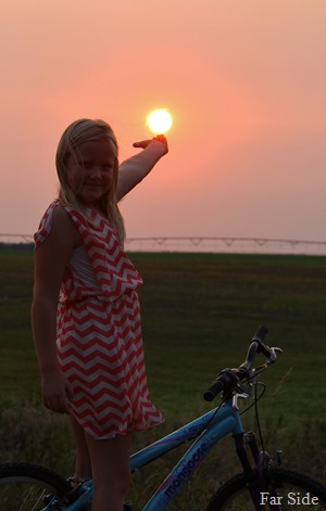 Anna holding the sun