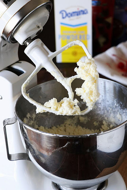 Mixing Filling Dough for Homemade Chocolate Covered Cherries Image