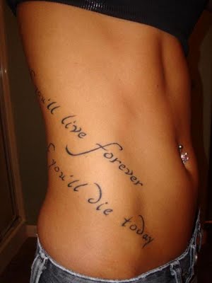 tattoos for girls on side of stomach. Girl Rib Side Lettering Tattoos 