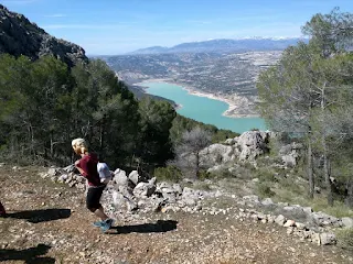 Hiker, mountains, a lake