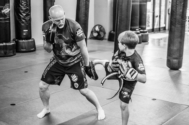 kids practicing kickboxing combinations at red dragon martial arts in morristown TN