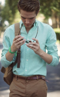 a tie to the suit turquoise shirt photo