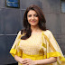 Kajal Aggarwal Latest Hot Glamourous Yellow Skirt PhotoShoot Images At Kajal Aggarwal Mobile App Launch