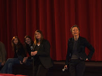 Cast and director of Un Chat, Un Chat, left, plus Berlinale representative, await questions at the Berlinale; photo by Val Phoenix