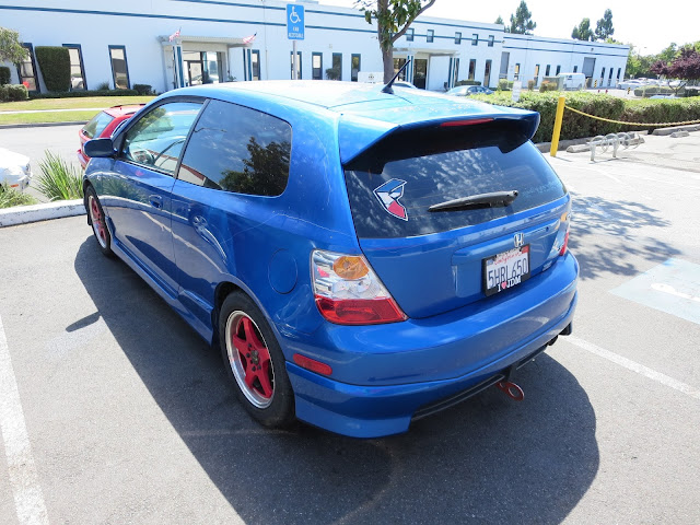 Civic with peeling paint and key scratches before paint at Almost Everything Auto Body