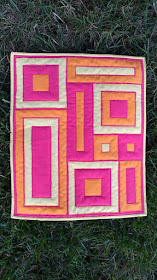 Modern mini quilt using Kona solids, Aurifil thread, Hobbs Batting, and reverse applique