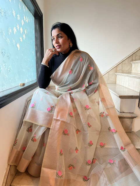 Embroidered saree with flower motifs