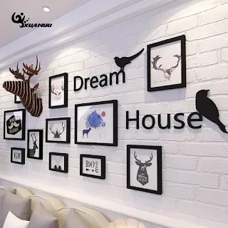 Como fazer uma composição de quadros na parede de sua casa