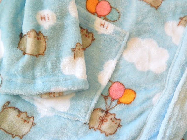 A photo showing the dressing gown design from the Pusheen Box Autumn 2018 