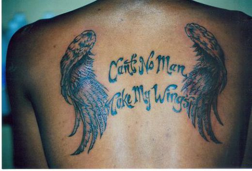 Another wings tattoo with a meaningful lil verse Can't No Man Take My