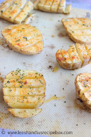 Buttery Scored Potatoes