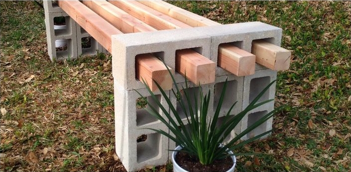 For a dead simple way of building a garden bench, simply stack blocks 