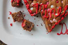 Food Lust People Love: Bake a Big Be Mine Heart Cookie for your sweetheart. A big M&M cookie cake baked in a heart pan and decorated with red sugar icing:  Be Mine!