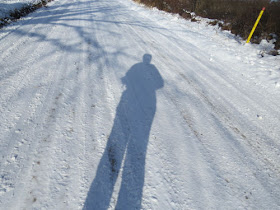 shadow of hiker on snow