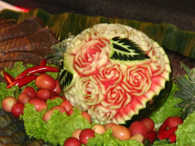 Watermelon carving art - seen at curiousphotos.blogspot.com