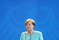 German Chancellor Angela Merkel delivers a statement about Trump’s global climate deal announcement at the Chancellory in Berlin, Germany, June 2, 2017. (Credit: Reuters/Fabrizio Bensch)