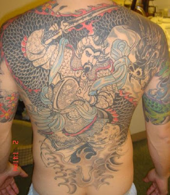 I did this tattoo on a good buddy of mine.. Dragon Tattoo Art.