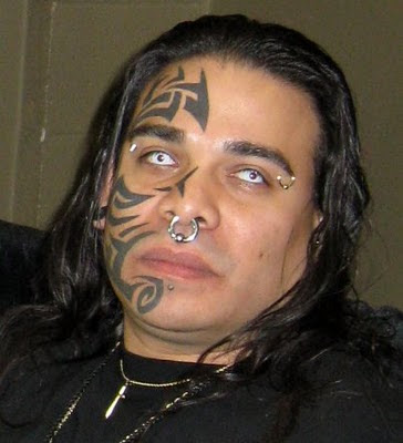 Tribal half face tattoo Tribal half face tattoo