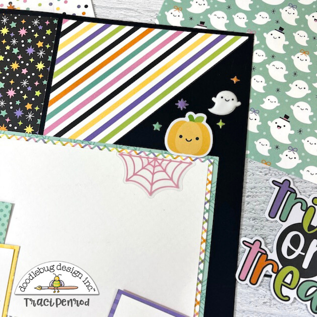 12x12 Halloween Scrapbook Page Layout with a spider web, pumpkin, ghost, and stars
