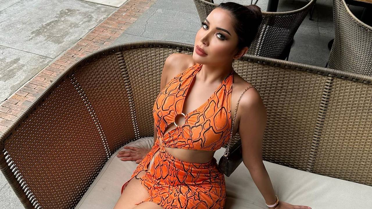 Millen Cyrus – Most Beautiful Transgender Women's Fashion in Orange Snake Print Maxi Dress