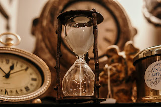 Clocks and watches in a sepia tone.