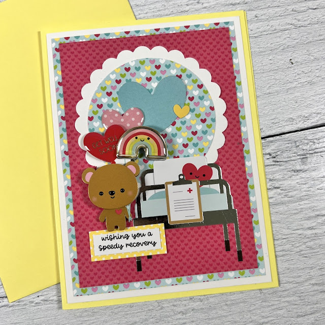 Get Well Handmade Card with a cute bear, balloons, a rainbow, a hospital bed, and colorful hearts
