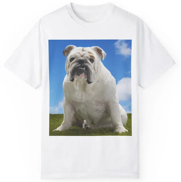 Unisex Garment Dyed Comfort Colors T-Shirt With Giant White English Bulldog Sloppy Sitting on a Green Grass and Blue Sky in the Background