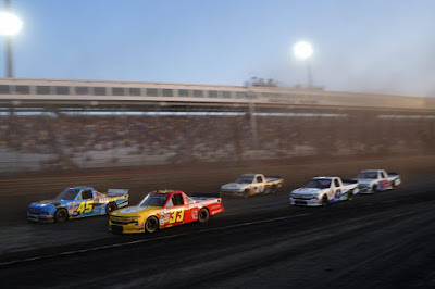 Drivers race during the NASCAR Camping World Truck Series Clean Harbors 150.