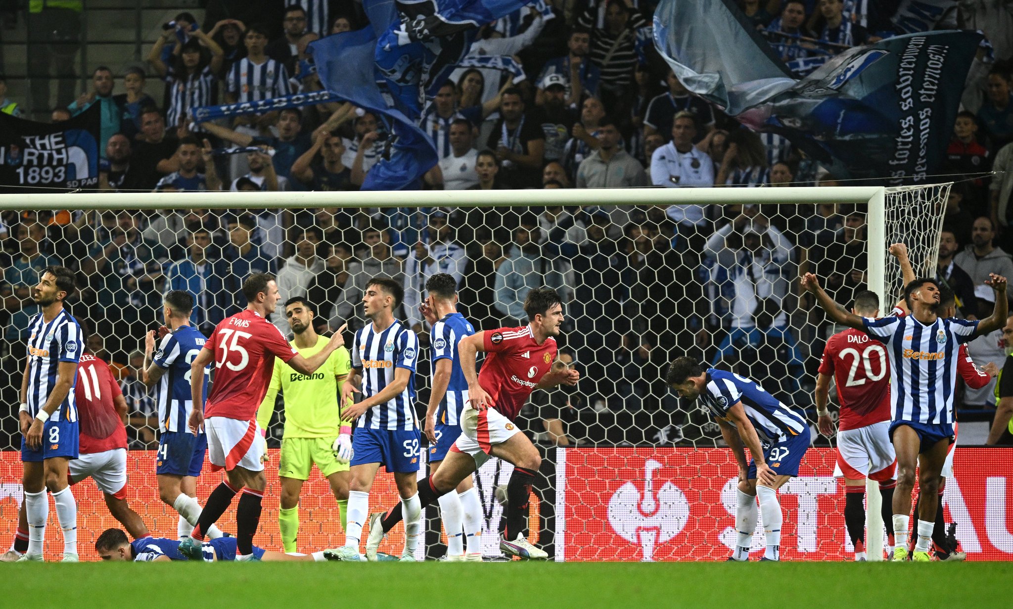 Defender, Harry Maguire, celebrates after leveling late for Manchester United in the Uefa Europa League 2024/25 League Phase match against FC Porto on Thursday 3 October, 2024 at Estadio Do Dragao