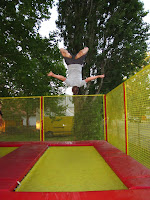 Man bouncing on trampoline