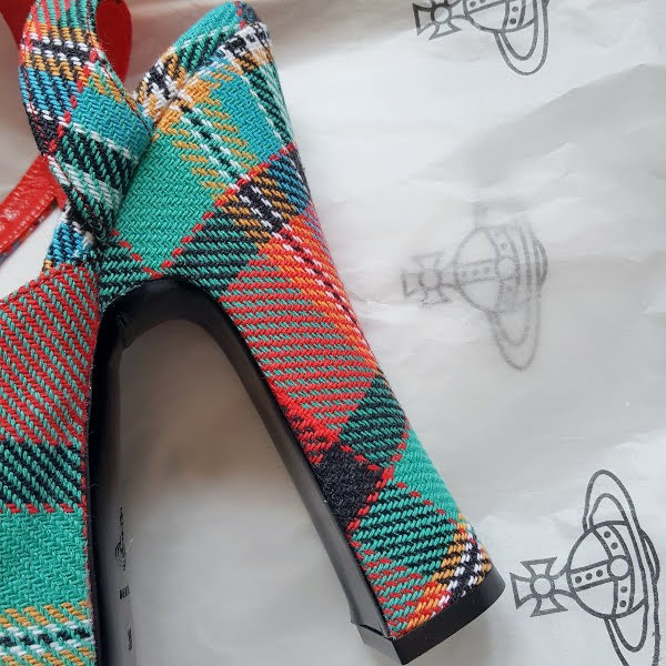 close up of tartan heel on shoe